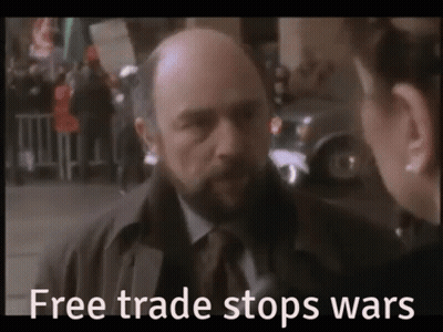 Bald Man With Beard Talking To Woman Free Trade Stops Wars GIF