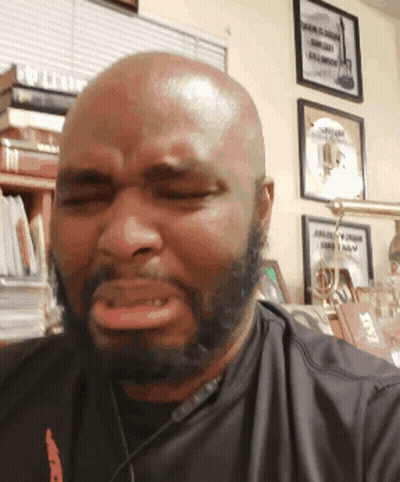 Bald Man With Beard Wearing Black T-Shirt GIF