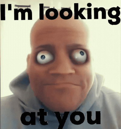 Bald Man With Big Eyes Looking GIF