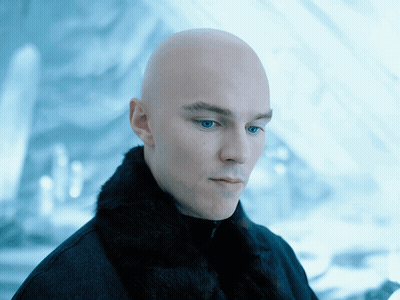 Bald Man With Blue Eyes In Black Coat GIF