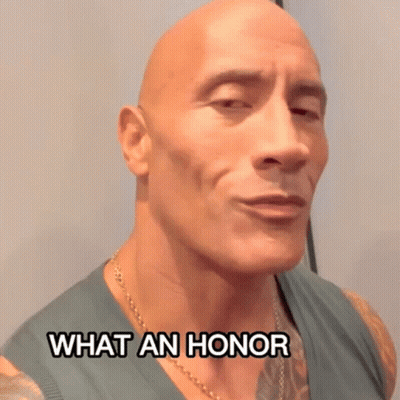 Bald Man With Chest Tattoo Making Funny Face Saying What An Honor GIF