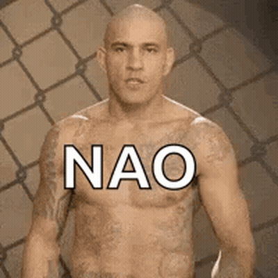 Bald Man With Chest Tattoos Standing At Fence GIF