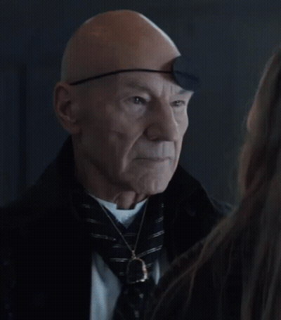 Bald Man With Eye Patch Looking At Woman Saying Yes GIF