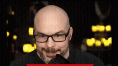 Bald Man With Glasses And Beard Making A Face GIF