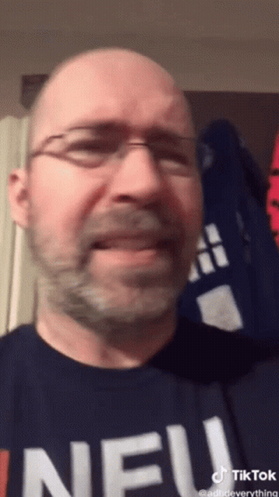 Bald Man With Glasses And Beard Wearing Neu Shirt GIF