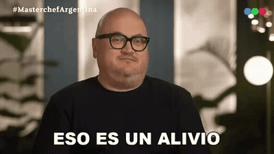 Bald Man With Glasses And Black Shirt Says Eso Es Un Alivio GIF