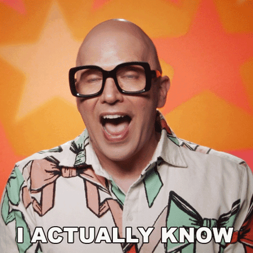 Bald Man With Glasses And Colorful Shirt Says I Actually Know GIF
