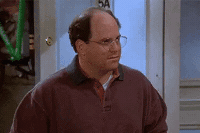 Bald Man With Glasses And Sweater At Door GIF