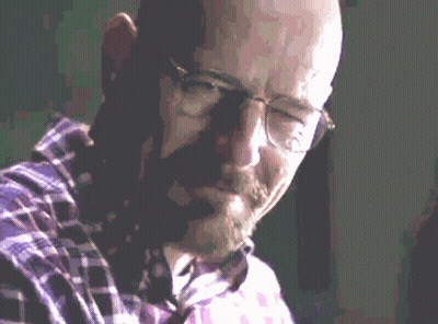 Bald Man With Glasses Talking On Phone GIF