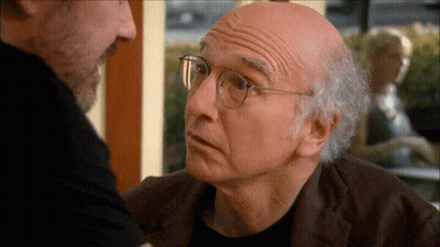 Bald Man With Glasses Talking To Another Bald Man GIF