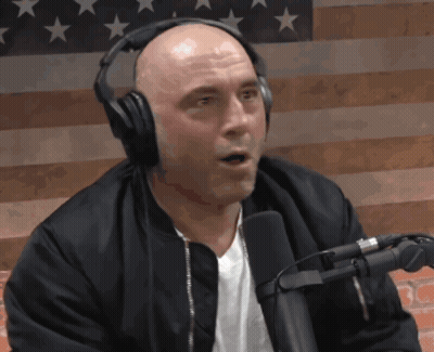 Bald Man With Headphones, Black Jacket And Microphone GIF