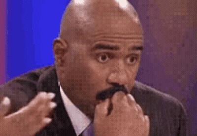 Bald Man With Mustache Covering Mouth GIF