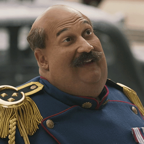 Bald Man With Mustache In Blue Uniform GIF
