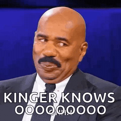 Bald Man With Mustache In Suit Saying Kinger Knows GIF