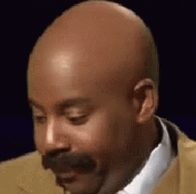 Bald Man With Mustache Making Funny Face GIF