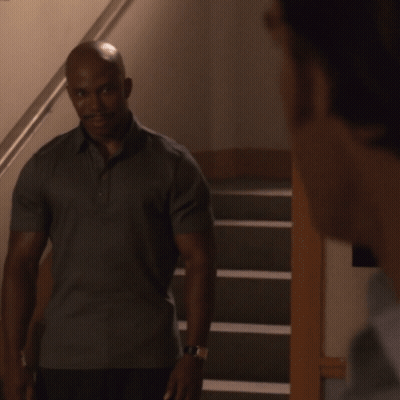 Bald Man With Mustache Next To Railing GIF