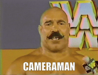 Bald Man With Mustache Saying Cameraman GIF