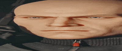 Bald Man With Red Zipper Jacket Says Iron GIF
