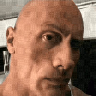 Bald Man With Serious Expression GIF