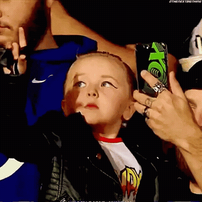 Bald Masked Wrestler Standing In Ring GIF