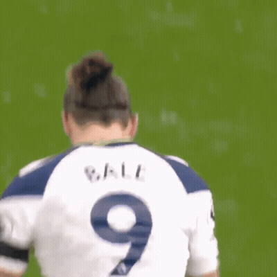 Bale Is Wearing A White Jersey With The Number 9 On It GIF
