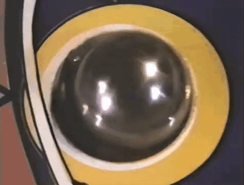 Ball In Yellow Circle On Blue Surface GIF