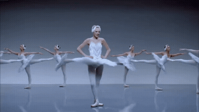 Ballerinas In White Tutus Dancing In A Line GIF