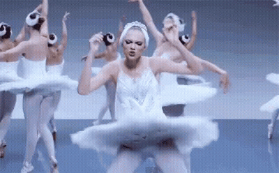 Ballerinas In White Tutus Dancing In Circle GIF