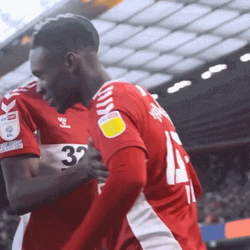 Balogun Hugging Teammates GIF