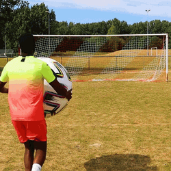 Balogun Kicking Huge Soccer Ball On Goal GIF