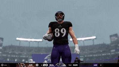 Baltimore Ravens Player In Black Jersey And Purple Shorts GIF