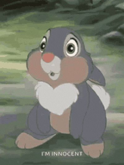 Bambi Rabbit Standing In Grass Looking At Camera GIF