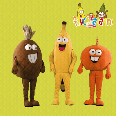 Banana Pineapple Orange Mascots In Front Of Fruchtaland Sign GIF
