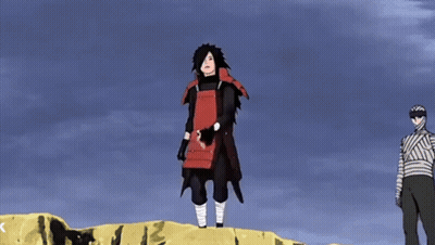Bandaged Man Next To Man In Red Vest GIF
