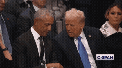 Barack Obama And Donald Trump Sit Next To Each Other In A Crowd GIF