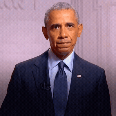 Barack Obama In Suit With American Flag Badge GIF