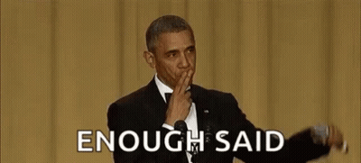 Barack Obama Is Covering His Mouth With His Hand While Giving A Speech At An Event . GIF