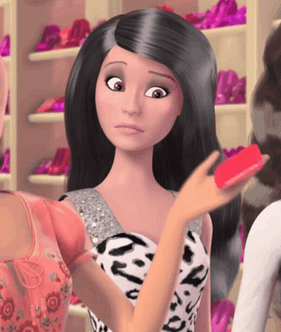 Barbie Doll Holding Red Object GIF