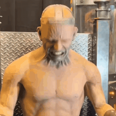 Bart Simpson Sitting In Chair With Chainsaw In Mouth Saying Help GIF