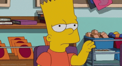 Bart Simpson Sitting In Front Of Bookshelf GIF