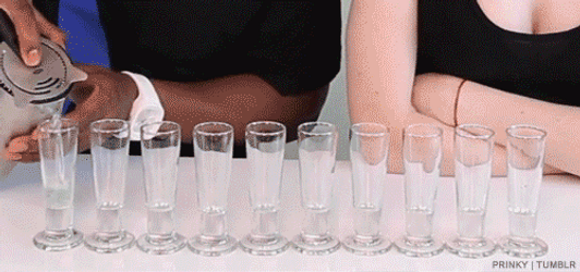 Bartender Pouring Colorful Drinks GIF