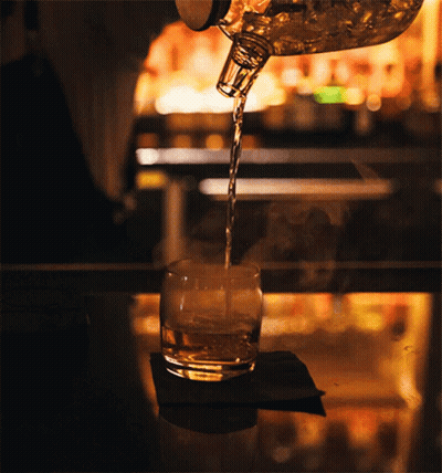 Bartender Pours Glass Of Whiskey GIF