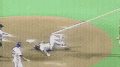 Baseball Catcher Kneeling As Player Runs GIF