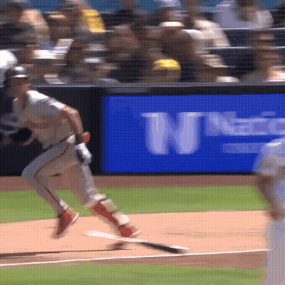 Baseball Game In Front Of Blue Sign GIF