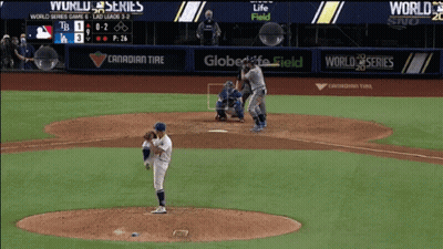 Baseball Game In Front Of Canadian Tire Ad GIF