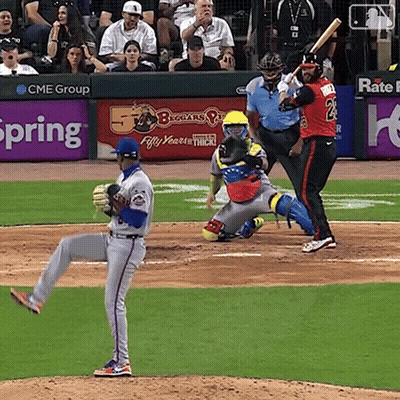 Baseball Game In Front Of CME Group Ad GIF