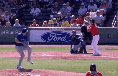 Baseball Game In Front Of Ford Banner GIF