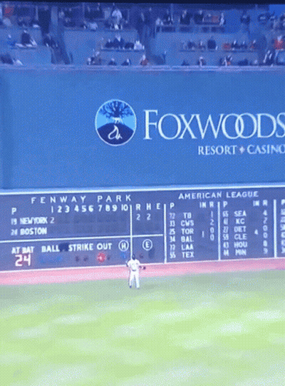 Baseball Game In Front Of Foxwoods Resort And Casino Sign GIF