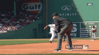 Baseball Game In Front Of Gulf Ad GIF
