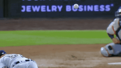 Baseball Game In Front Of Jewelry Business Sign GIF